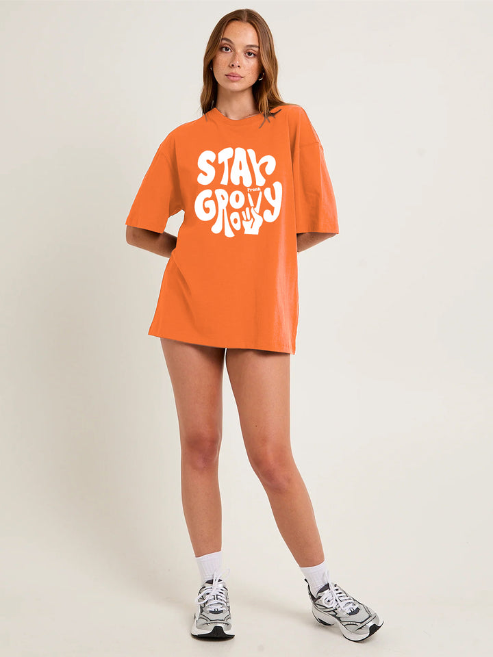 STAY GROOVY Women Graphic Oversized Printed T-Shirt